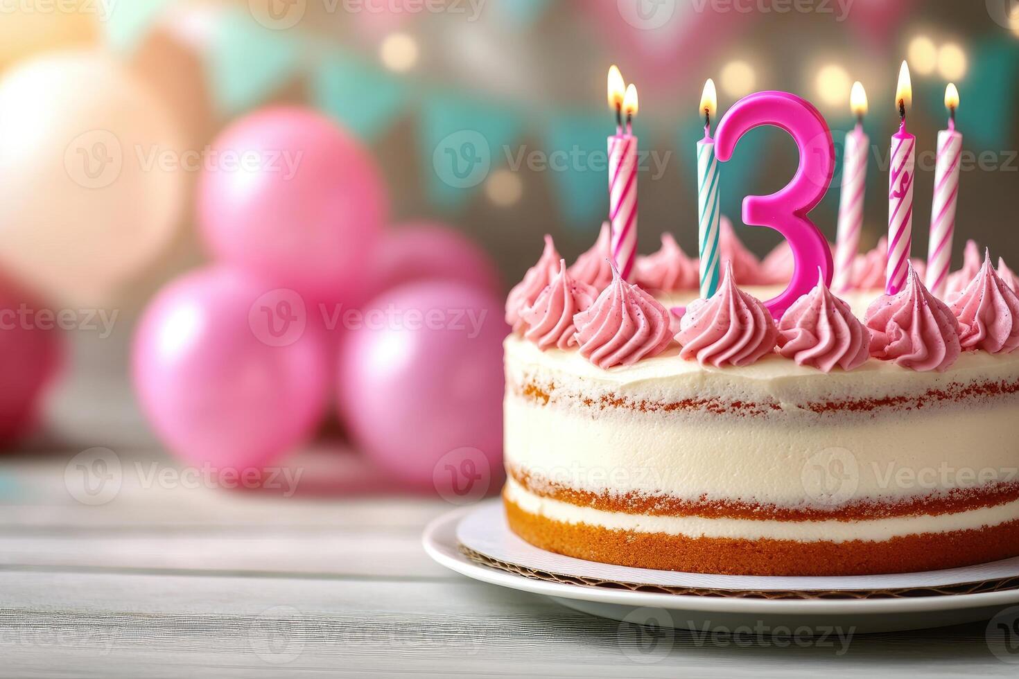 Delicious cake celebrating a third birthday with lit candles and pink balloons photo
