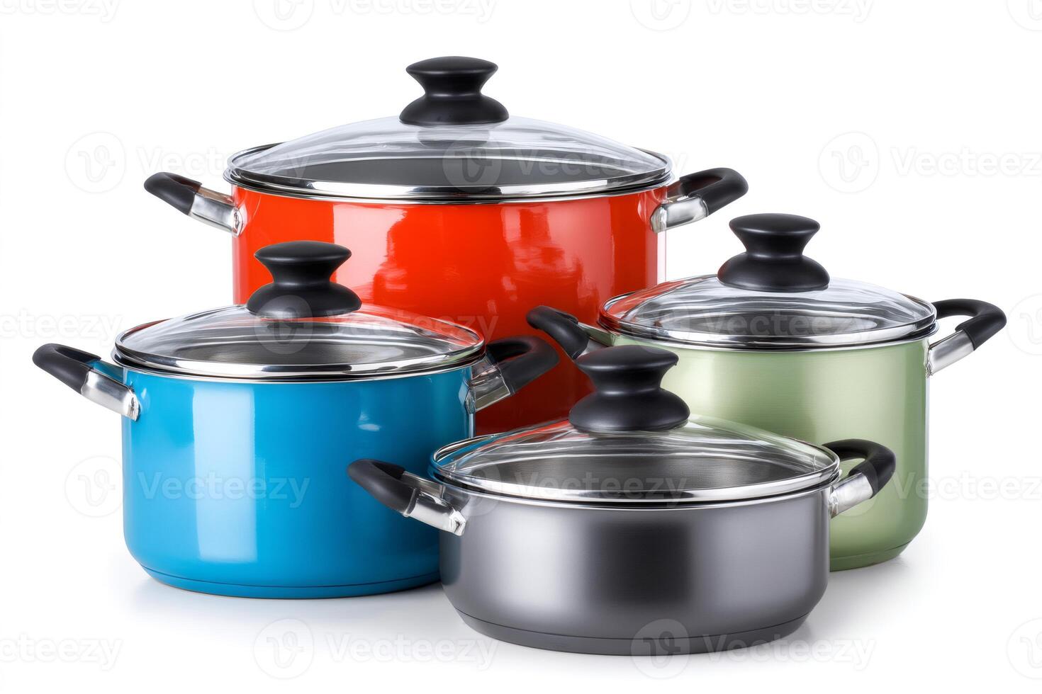 Colorful cooking pots with glass lids standing on white background photo