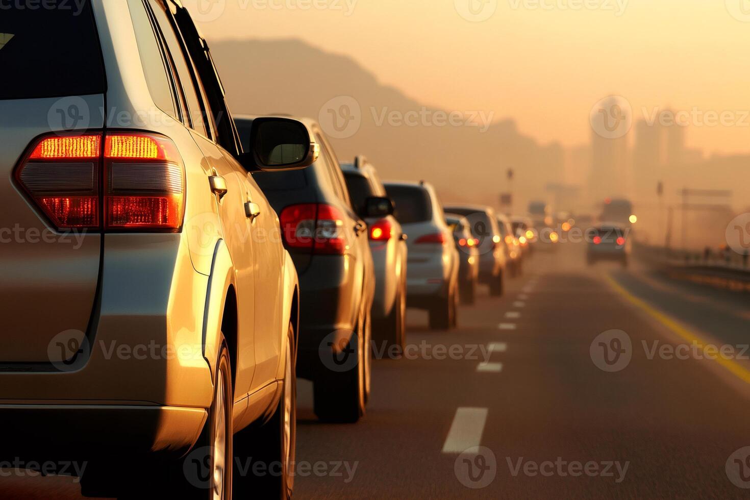 Cars standing in long queue on highway at sunset photo