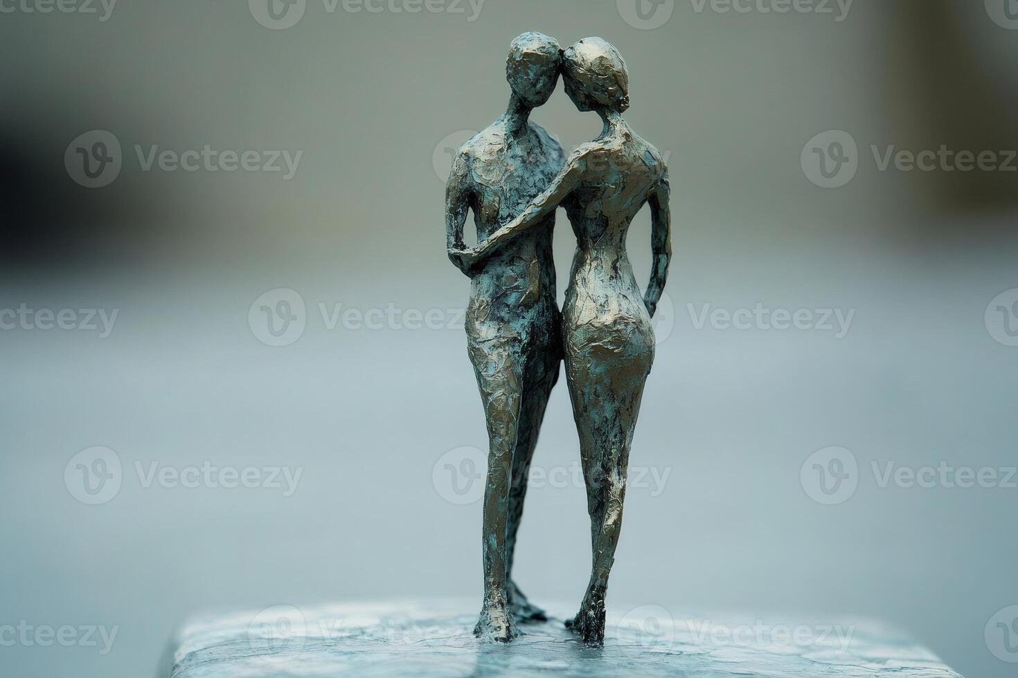 Lovers embracing bronze sculpture celebrating intimacy and affection photo