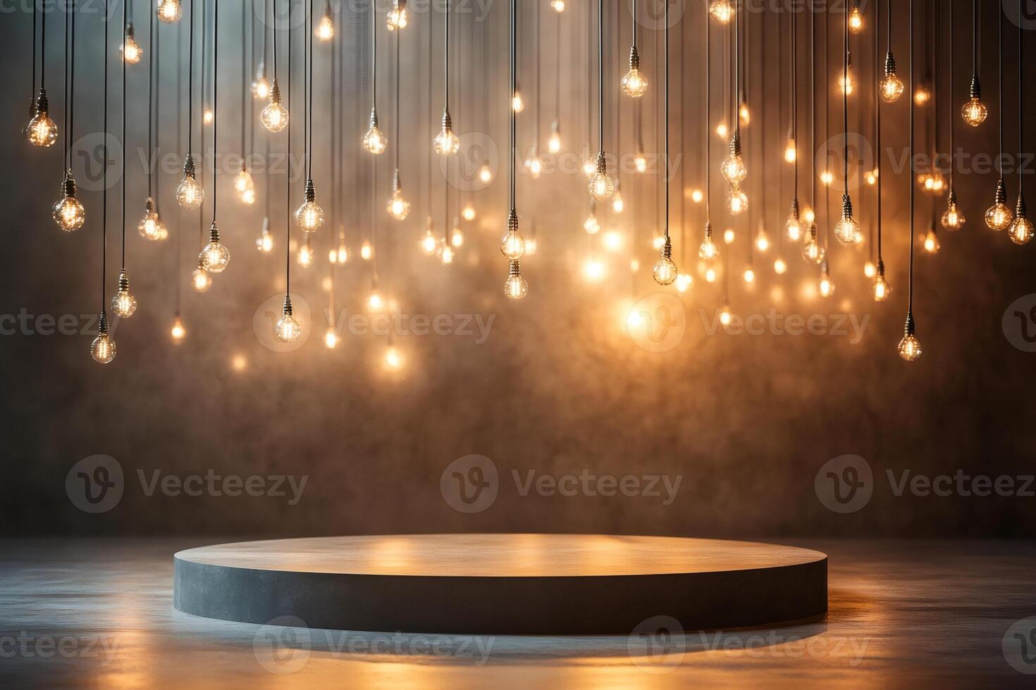 Empty round podium illuminated by hanging light bulbs creating a festive atmosphere photo