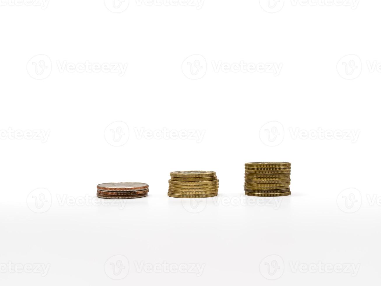 Pile of money or golden coins and white background, copy space photo