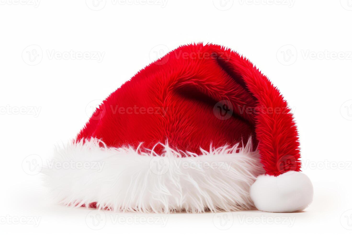 Classic santa claus hat resting on white background symbolizing christmas celebration photo