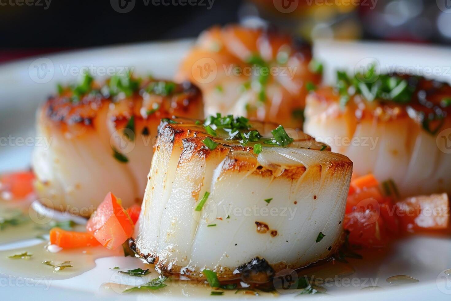 Seared scallops with tomatoes and herbs creating delicious seafood dish photo