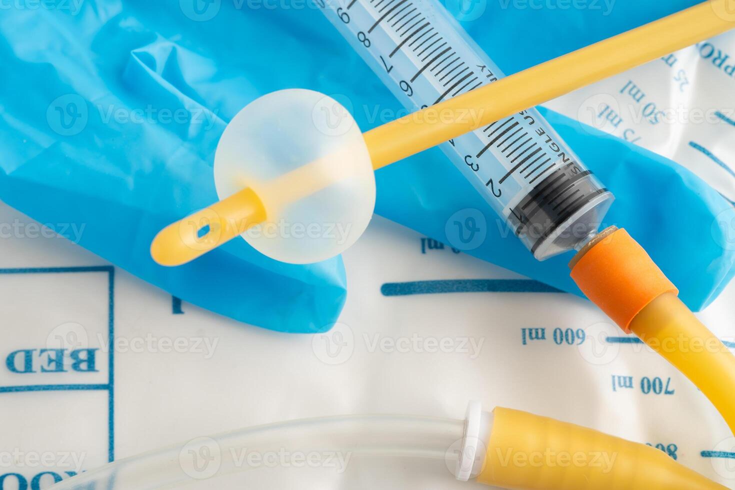 Foley catheter and urine drainage bag collect urine disability photo