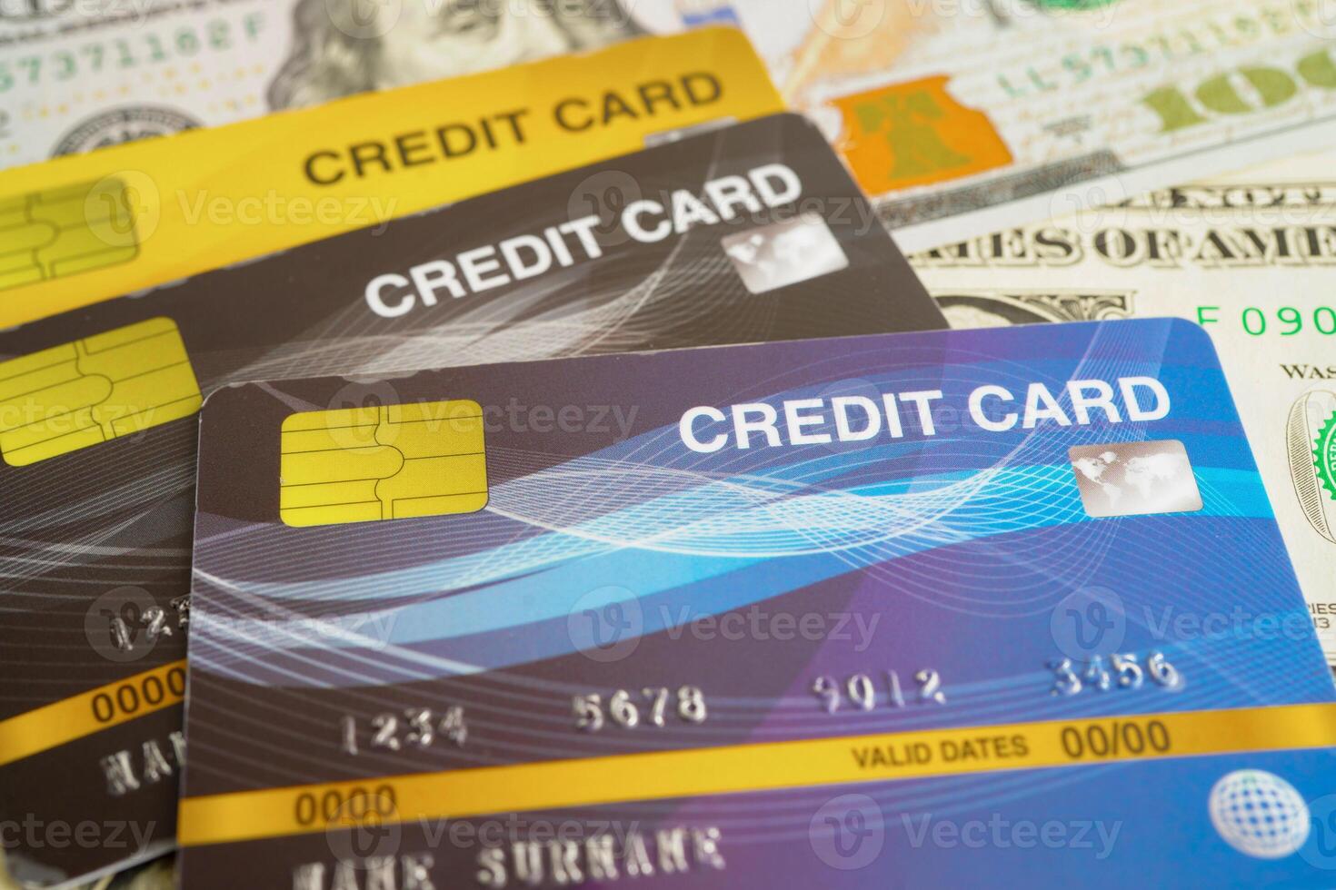 Credit card on US dollar banknotes, finance economy trading shopping photo