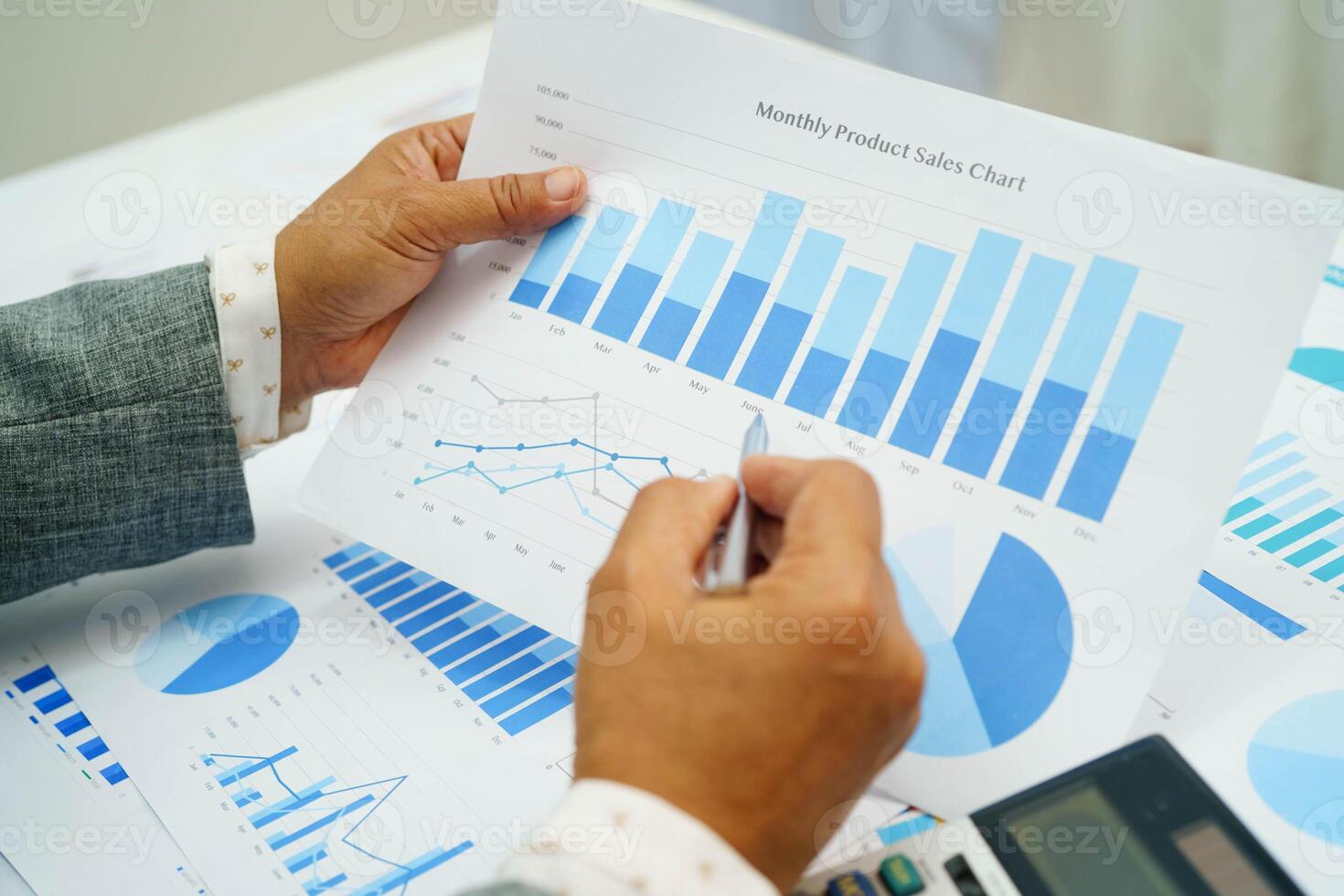 Asian business woman working with financial graph. photo