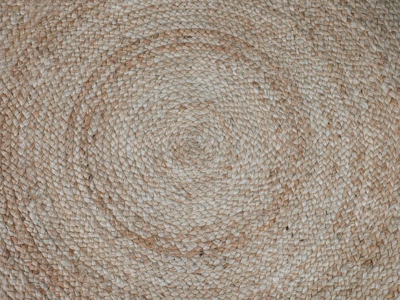 round napkin knitted from coarse canvas threads, textured background photo