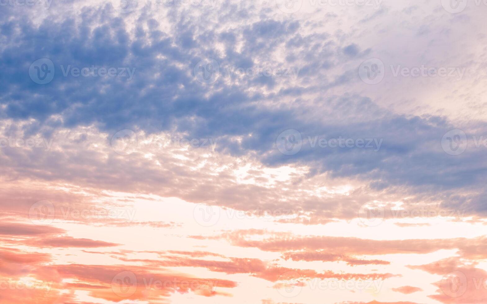 Sunset cloudy sky with beautiful color gradient. Cloud landscape, background. photo