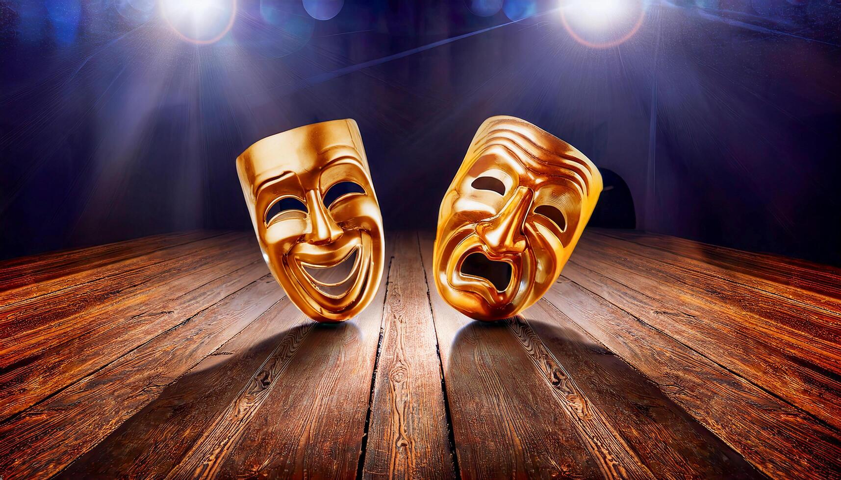 On the wooden stage lie two shining masks one of joy, one of despair - capturing the eternal contrast of human feeling that lives in every performance. photo