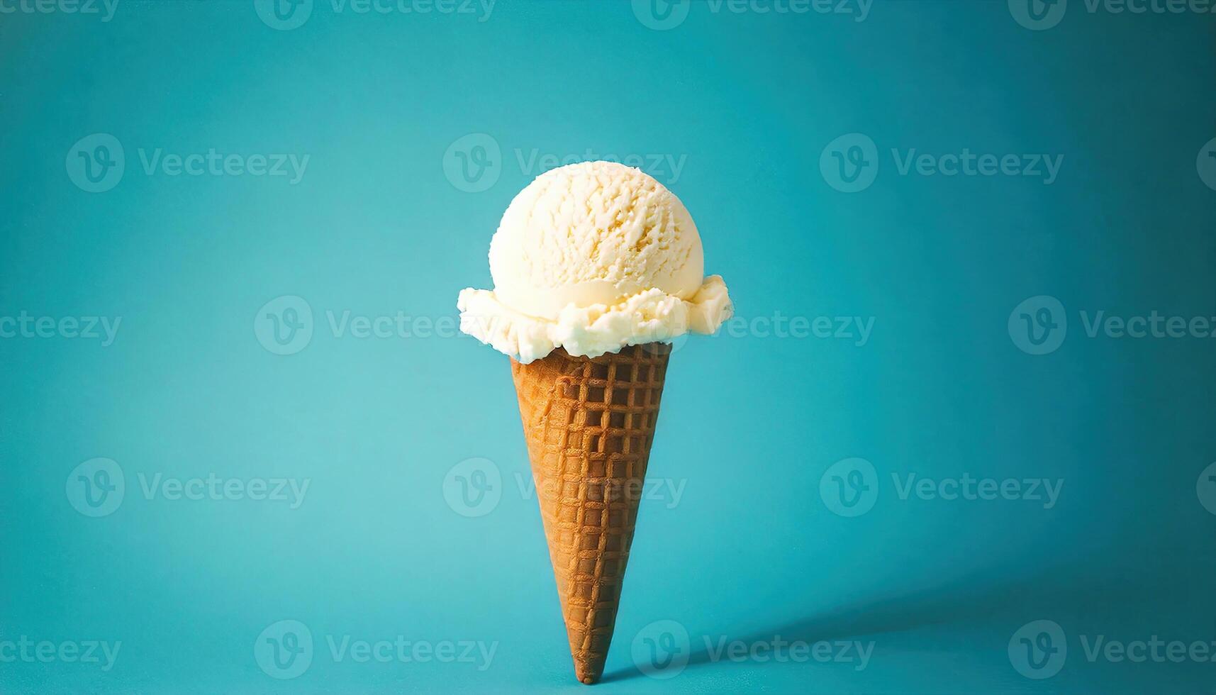 Vanilla ice cream in cone on the blue background photo