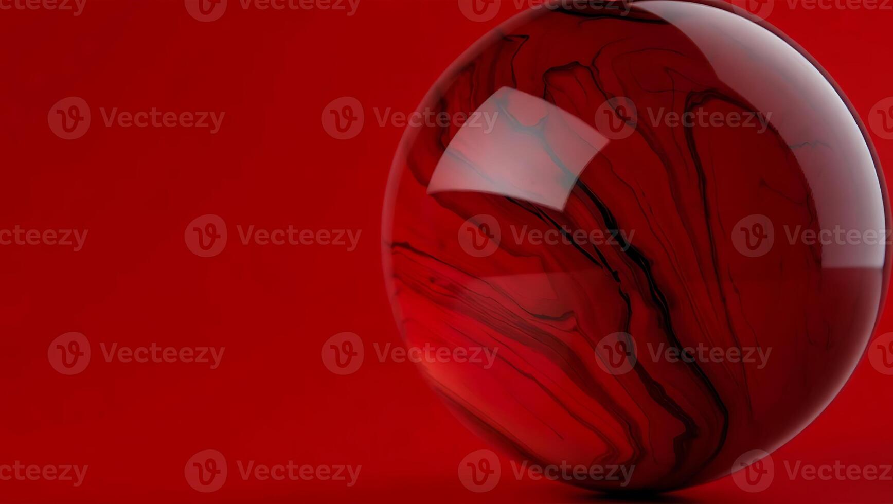 Realistic rendered glass sphere with a swirling red and black abstract pattern against a vibrant crimson background creating an artistic look photo