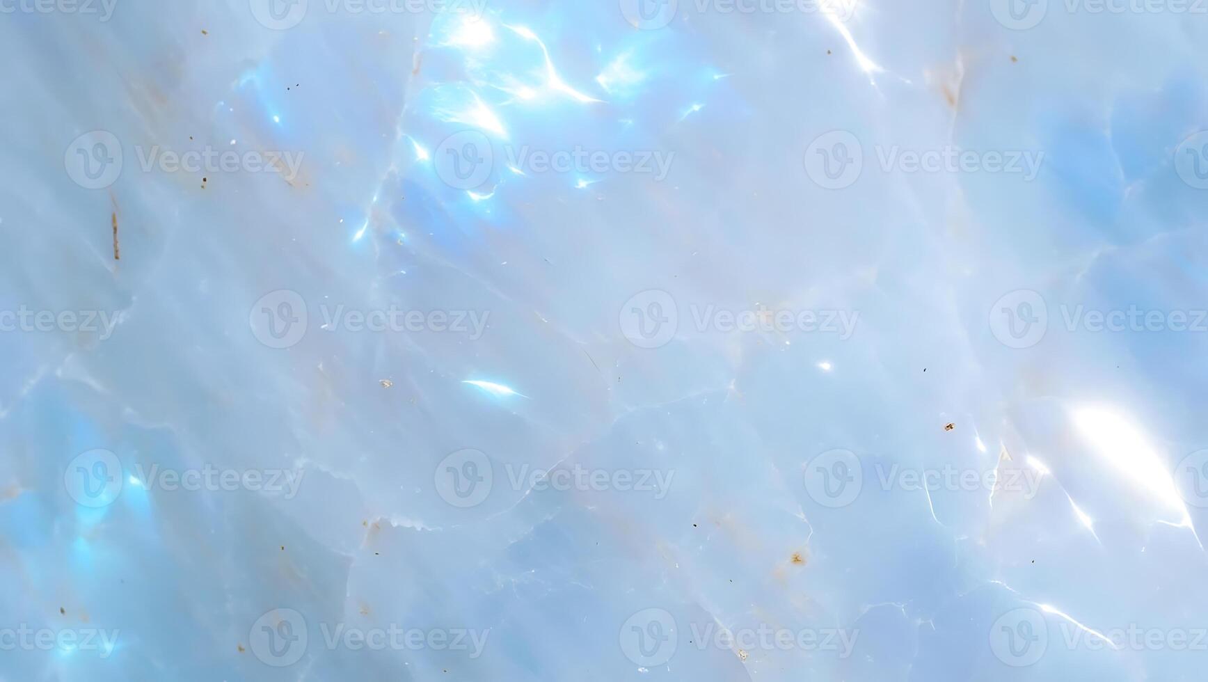 Soft ethereal blue quartz texture with natural patterns and subtle light reflections suitable for backgrounds and digital designs. photo