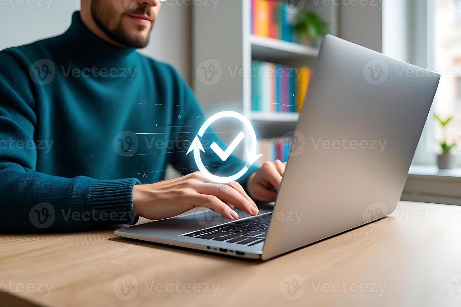 Man working on a laptop with a visual confirmation symbol suggesting successful completion of a task or project. photo