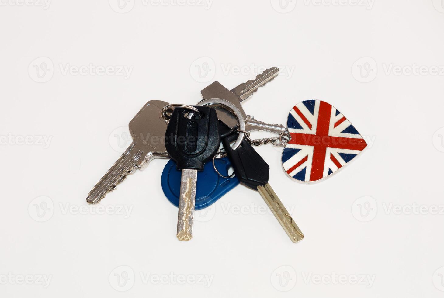 Multiple Keys with Union Jack Keyring Charm on White Background photo