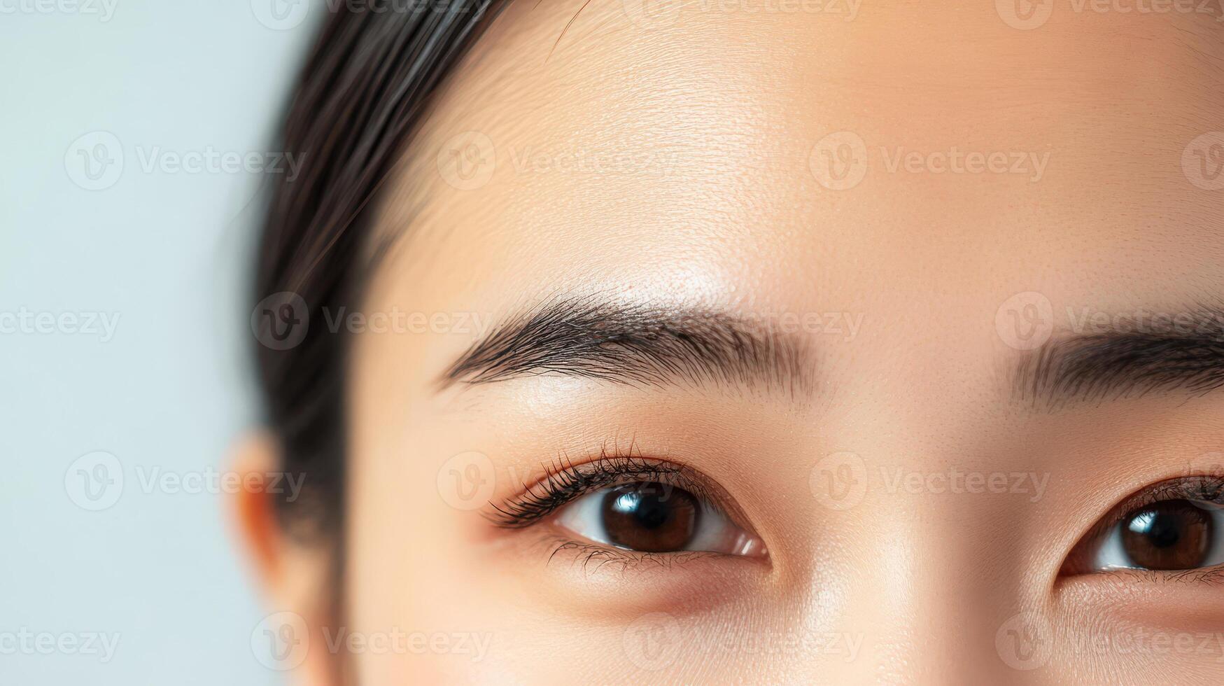 Close-up view of a person's face, eyes, and forehead. photo