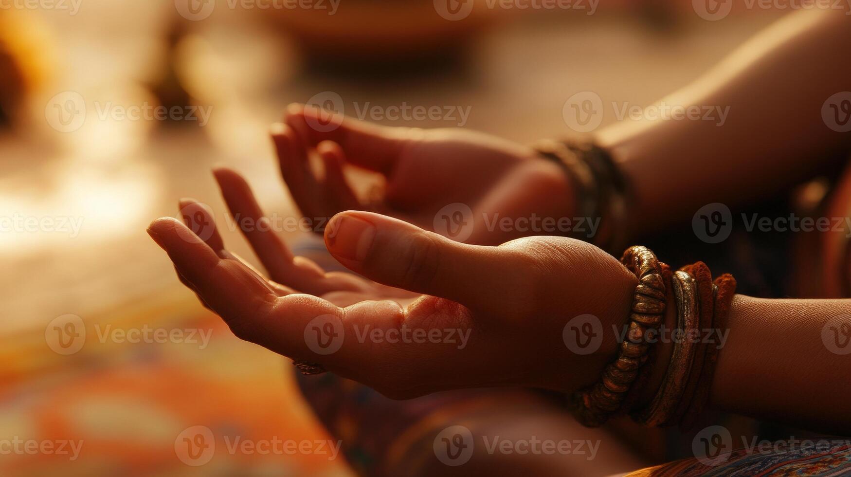 Close-up view of hands in meditative pose. photo