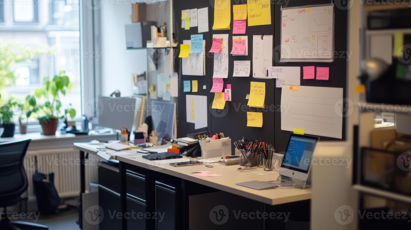 Busy workspace with colorful notes and organized items. photo