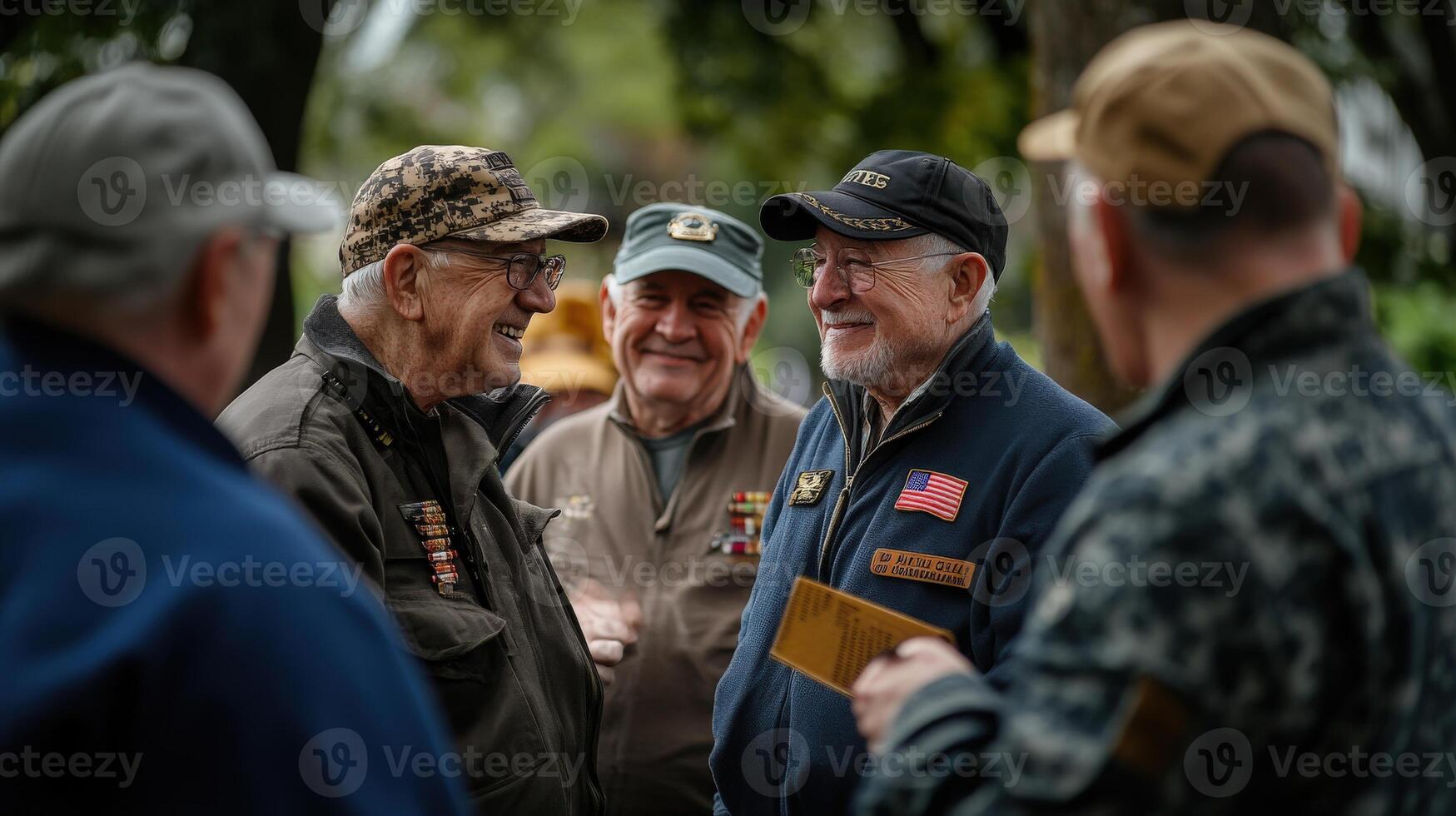 A group of veterans smiling and interacting outdoors together photo