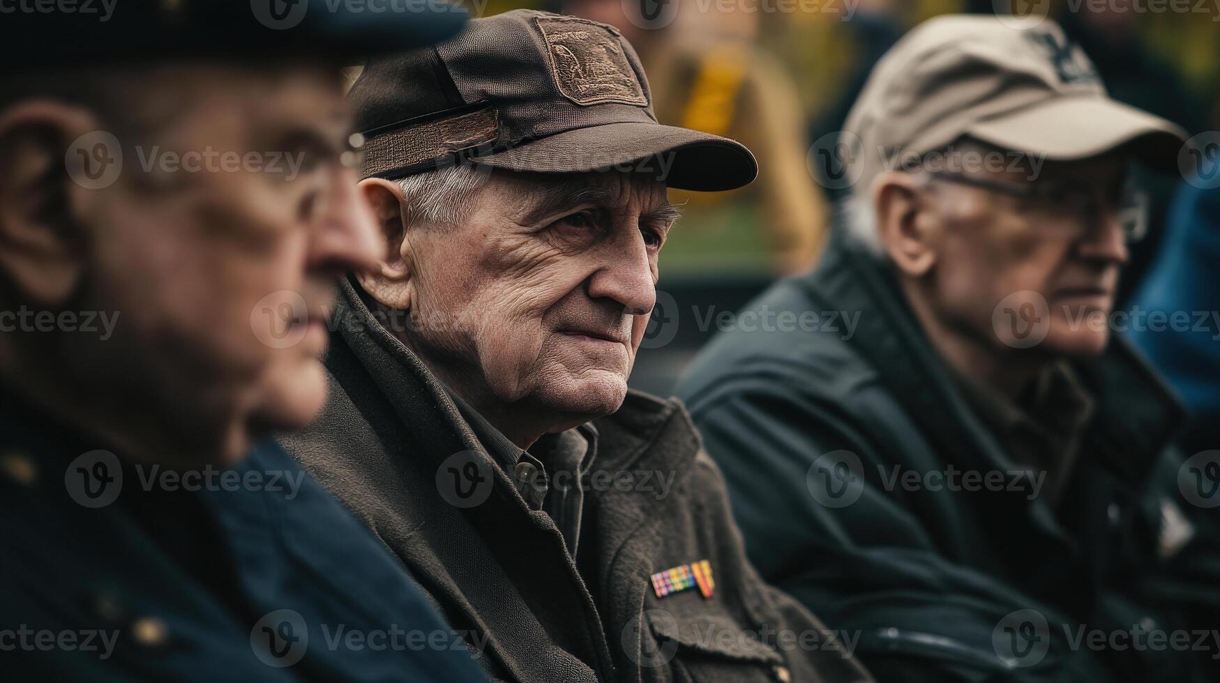 Elderly men sitting together observing a special event attentively photo