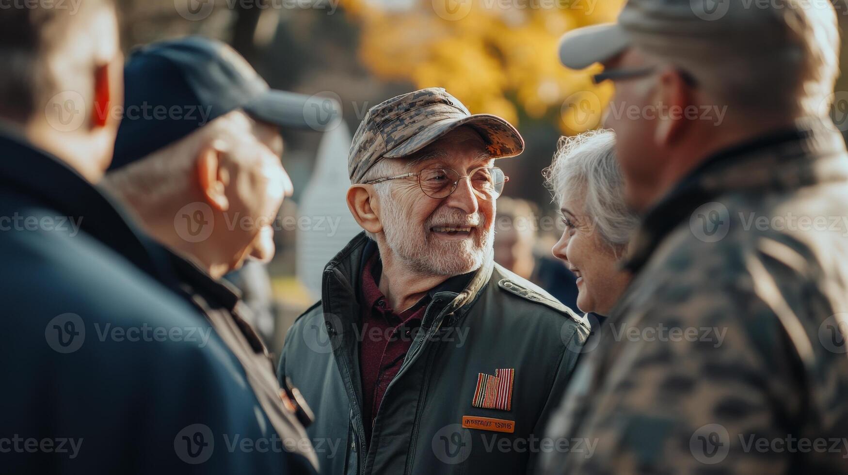 A group of senior people are smiling and socializing together outside photo