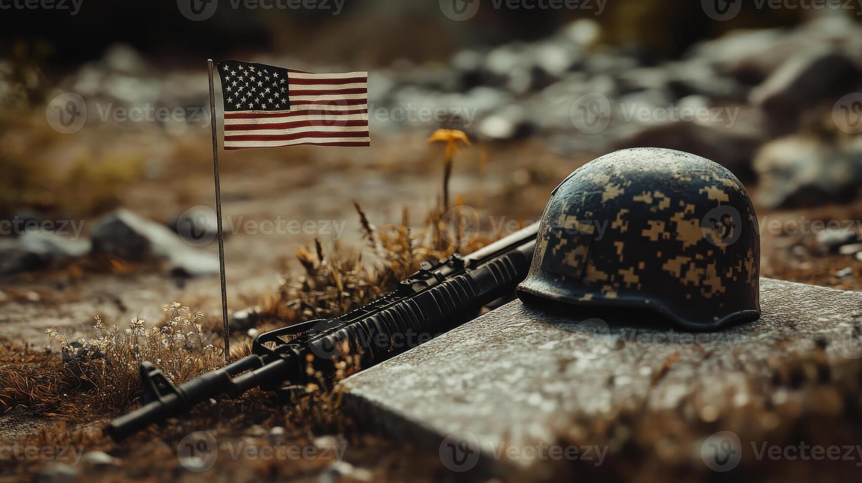A fallen soldiers helmet and weapon beside the national flag photo