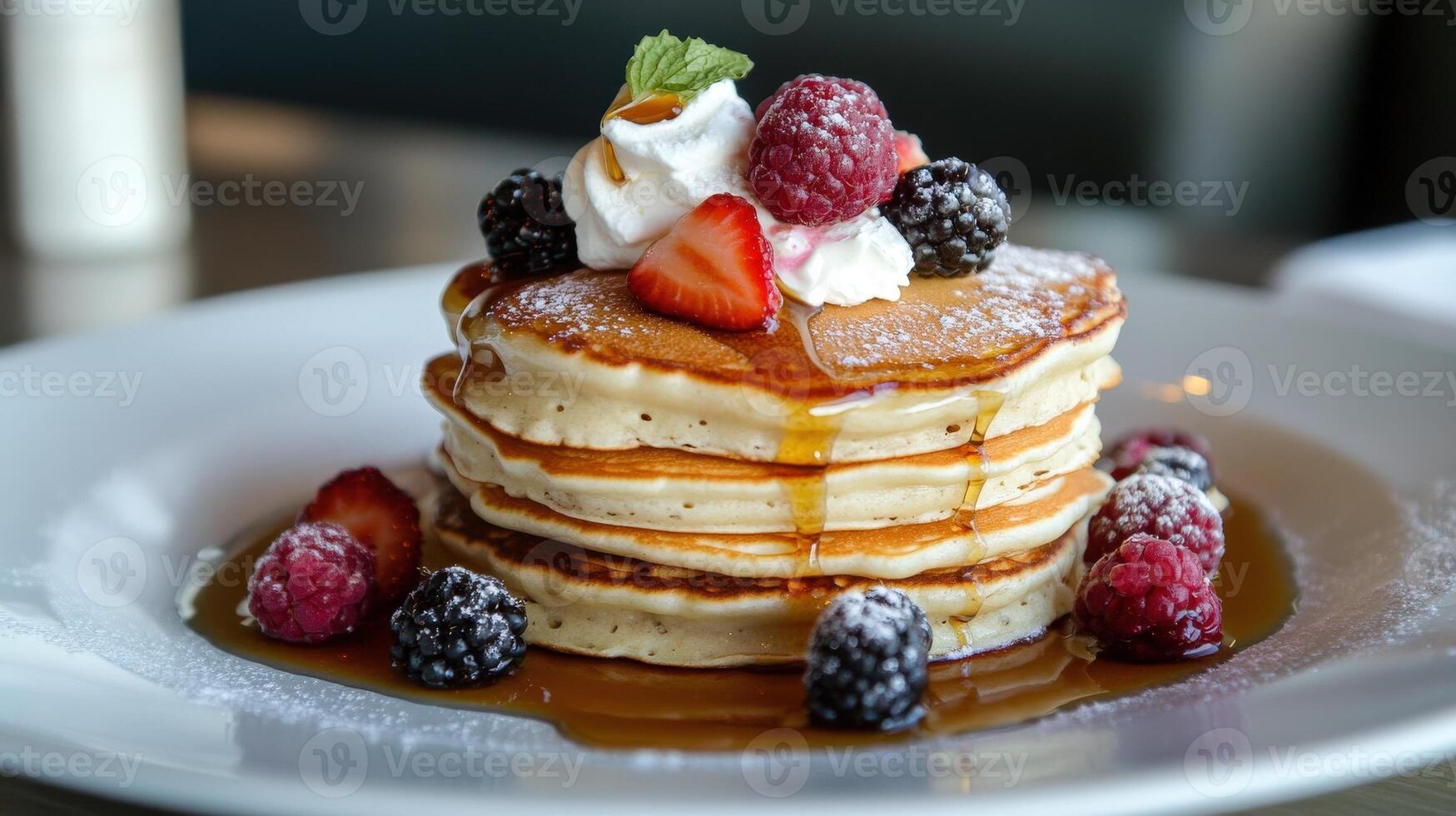 A stack of fluffy pancakes with berries and sweet toppings photo