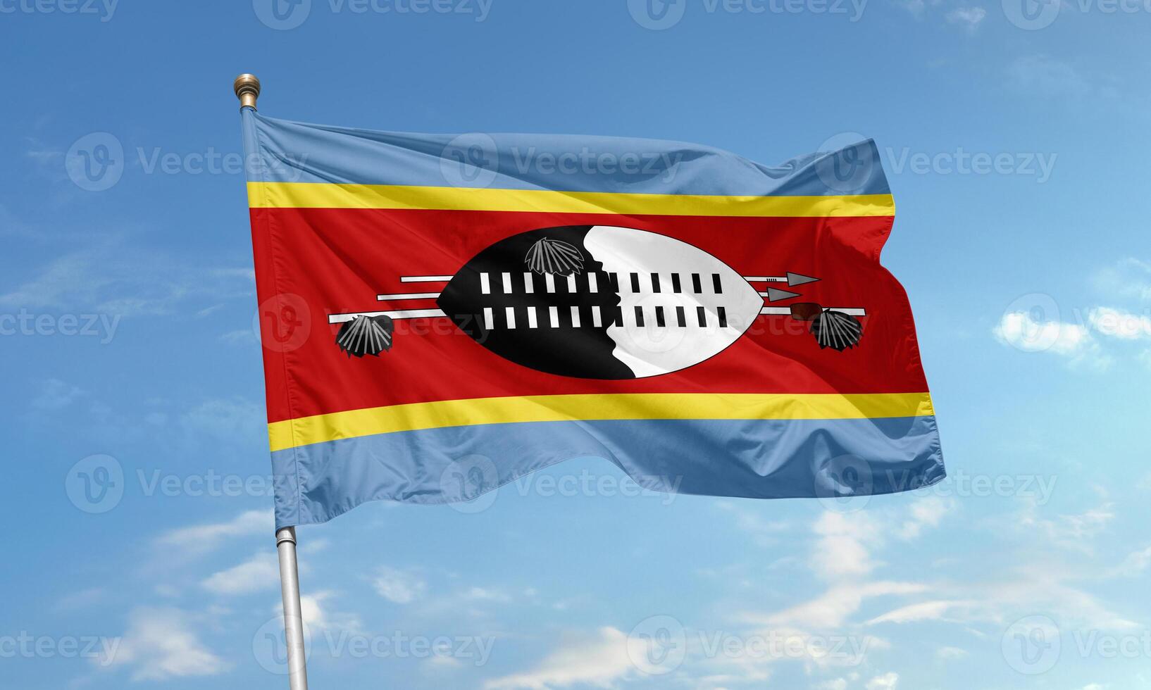 Eswatini national flag with shield and spears photo