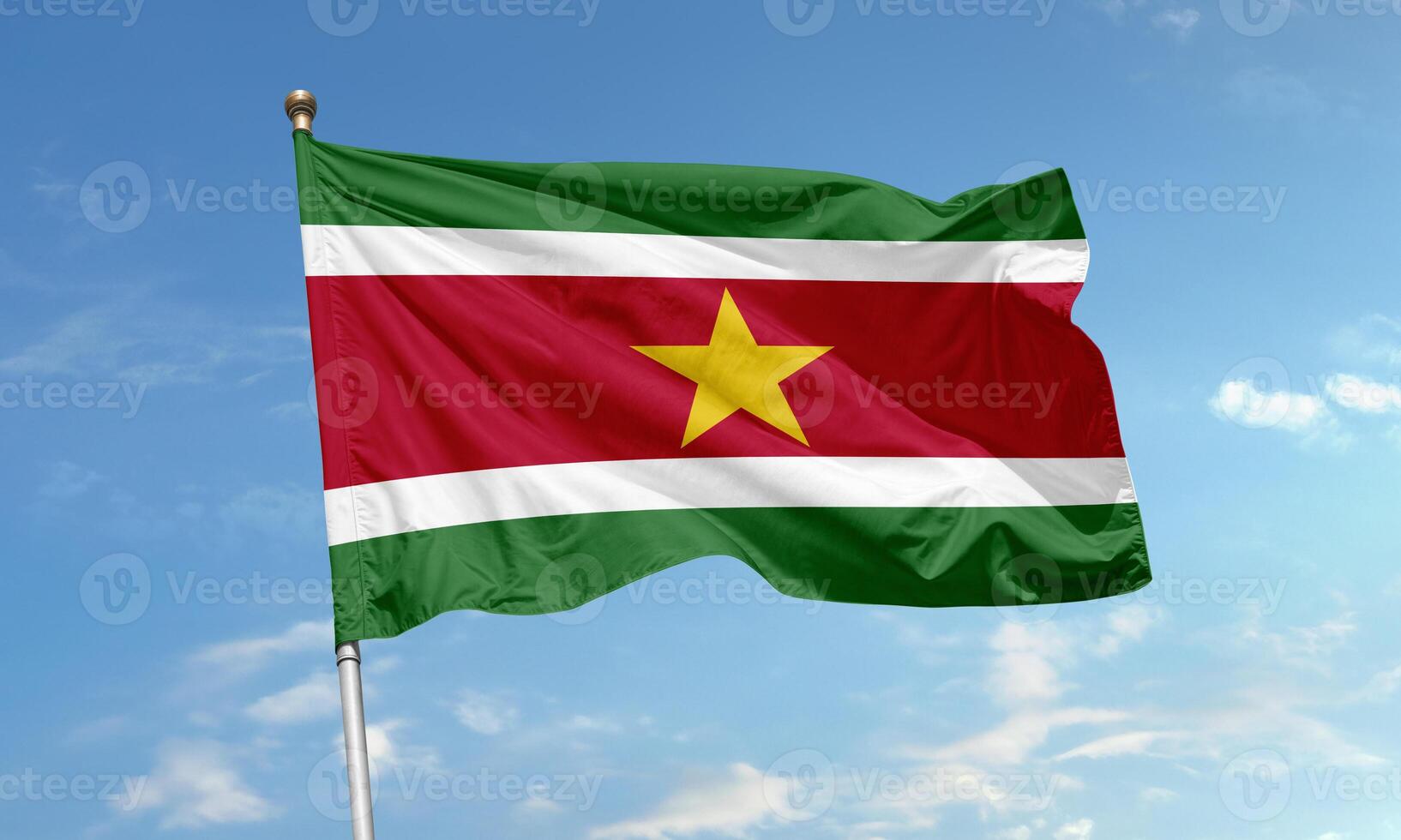 Suriname national flag with golden star photo