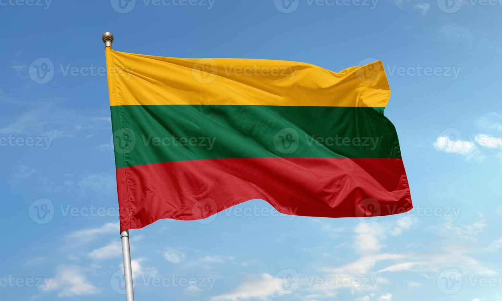 Lithuanian national flag waving in sky photo