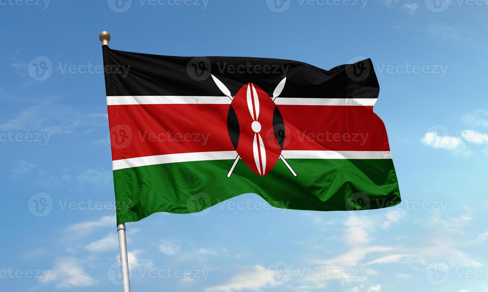 Kenyan flag waving in clear blue sky photo