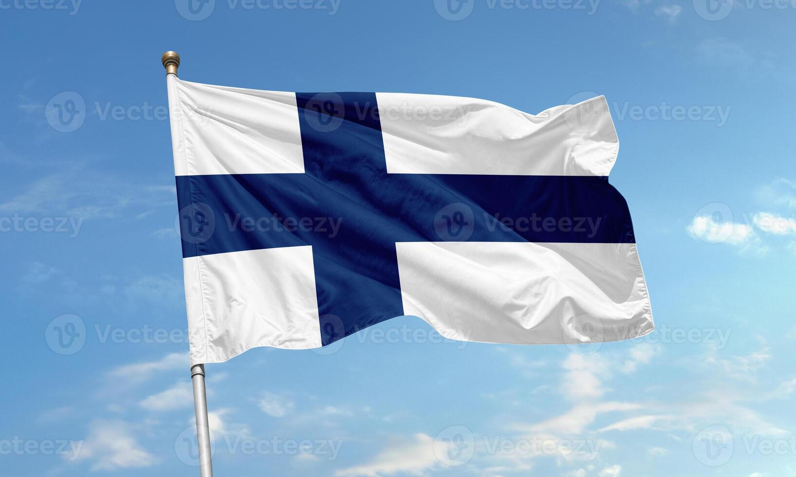 Finland national flag with blue Nordic cross waving in sky photo