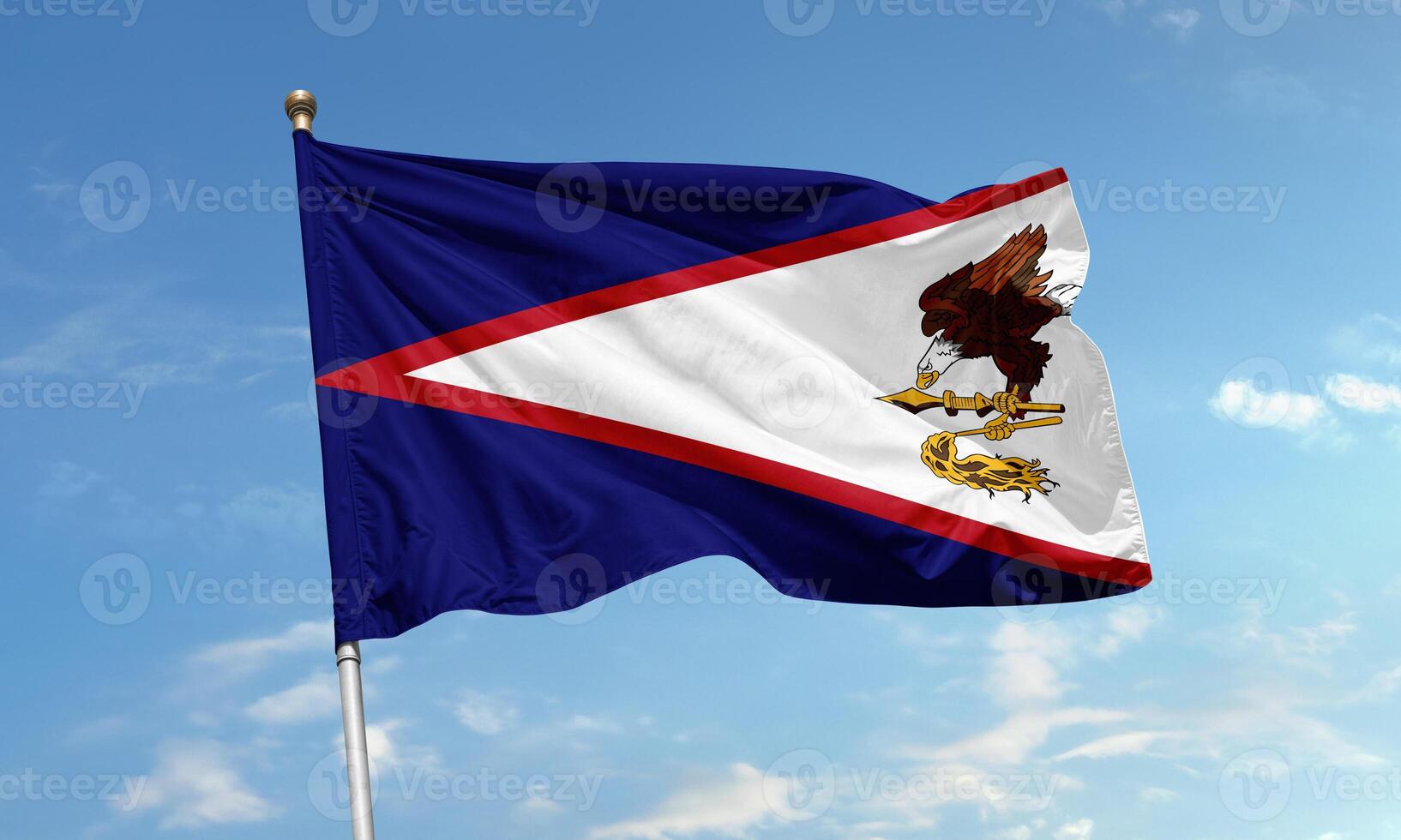 American Samoa national flag with bald eagle flying high in the sky representing strength and connection to the United States photo