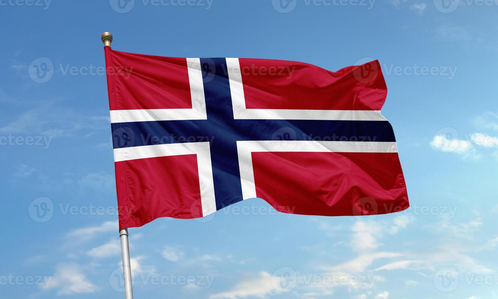 Norwegian national flag waving with blue Nordic cross photo