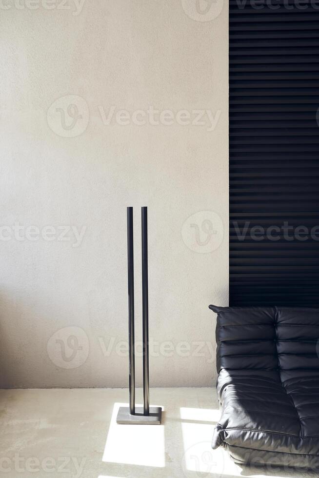 Modern design of an expensive interior, with a place for your design, paintings, posters. Brutal design. A loft-style room with a copy space photo