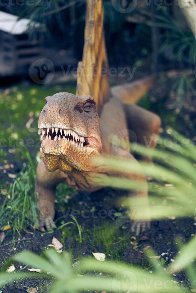 The dinosaur dimetrodon looks like a reptile, it has curved hind legs and the lower part of its body is pressed to the ground. There is a place to copy photo