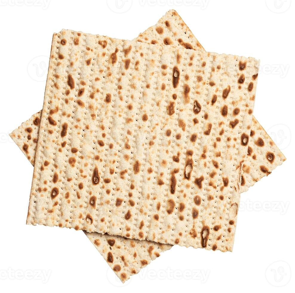 Two sheets of matzah stacked on top of each other, isolated on background. photo