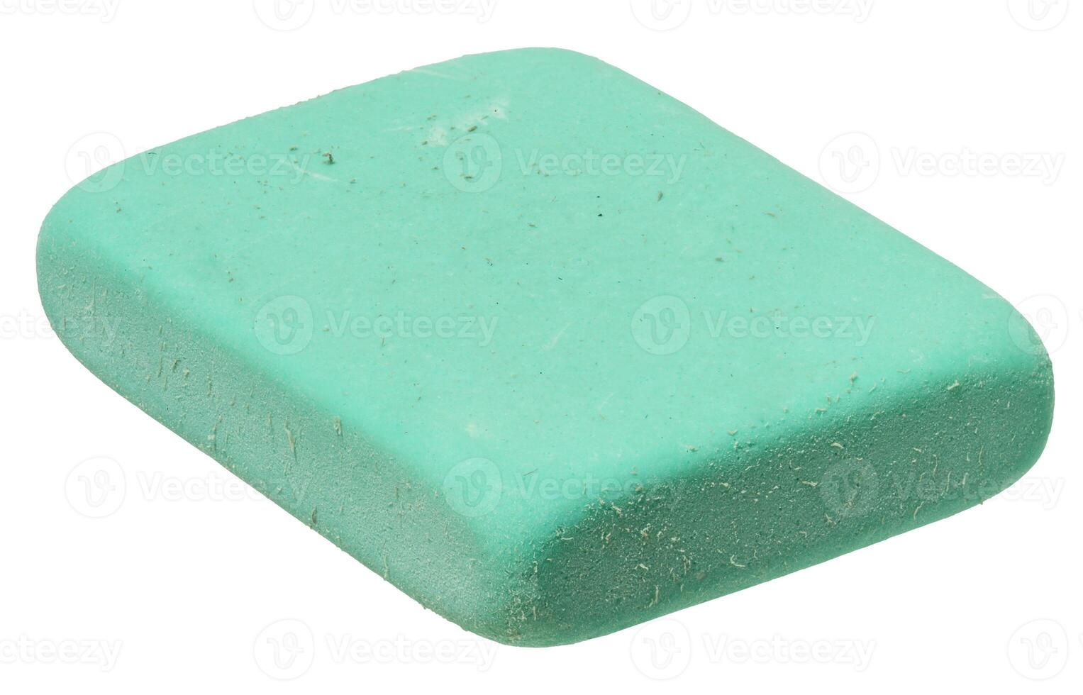 Close up of one green rectangular eraser on isolated background photo