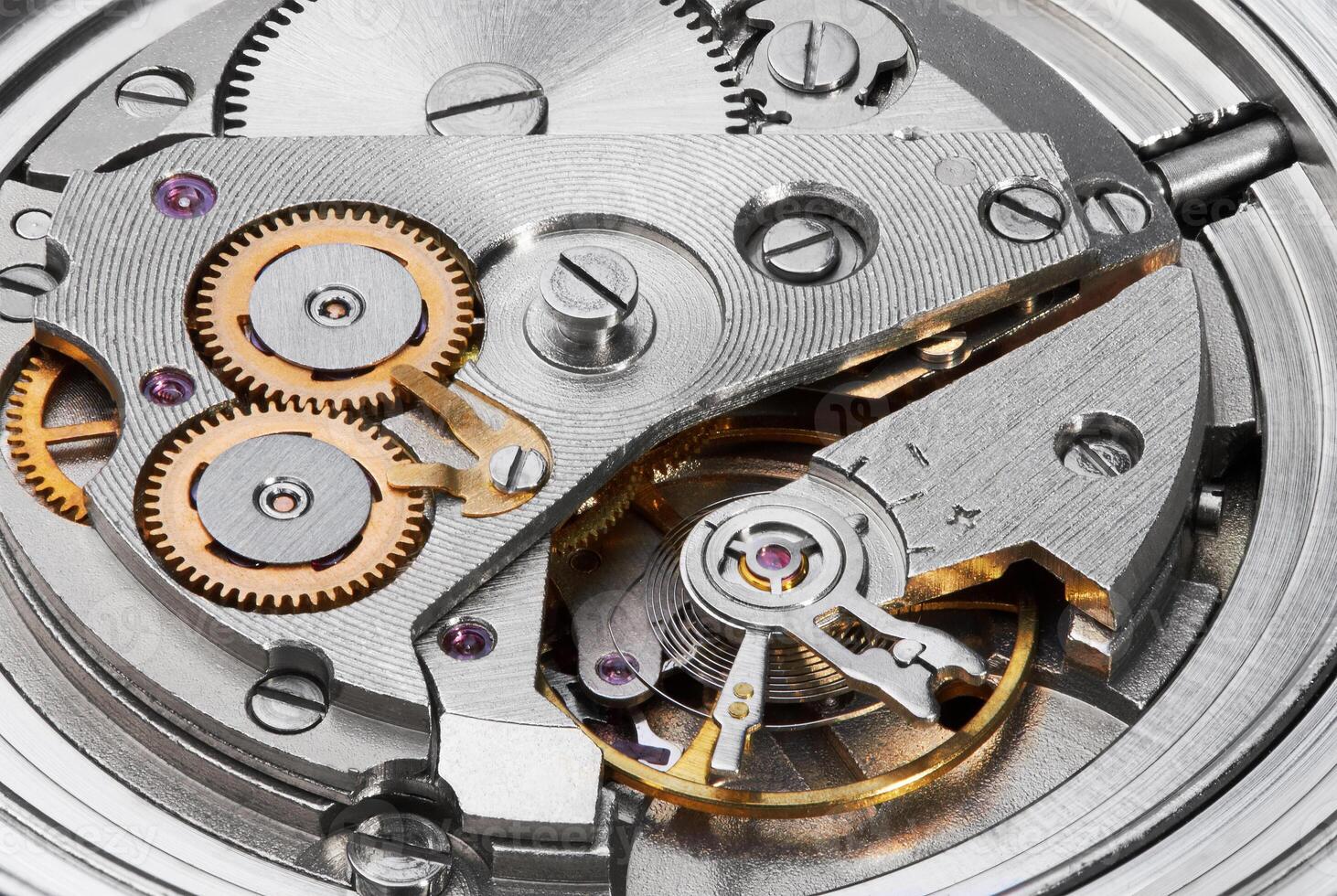 Clock mechanism with gears closeup photo