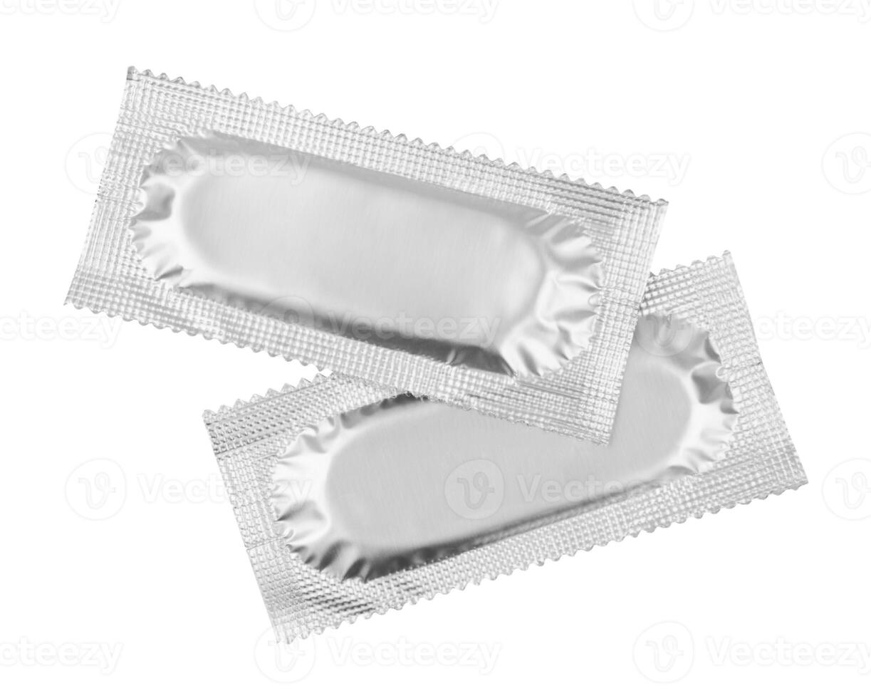Condom on white photo