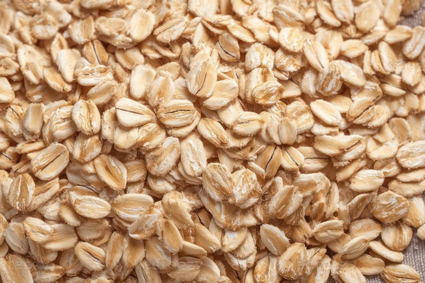 Rolled Oats Macro Photography High Resolution Texture of Dry Oatmeal Grains photo