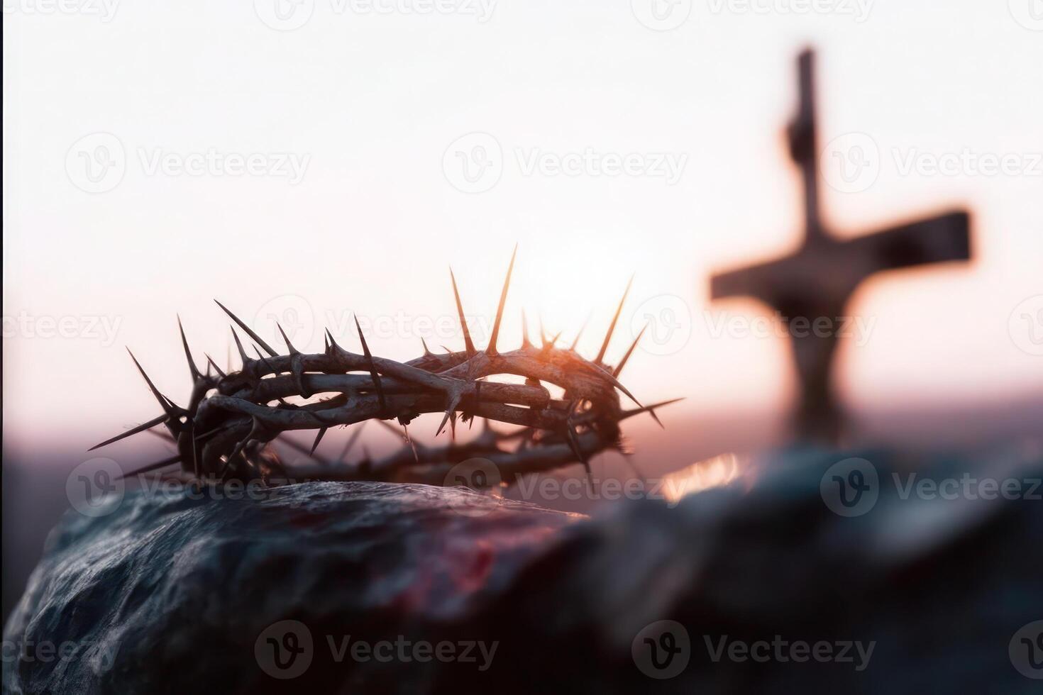 Crown of Thorns on Rock with Cross Silhouette at Sunset Religious Symbolism photo