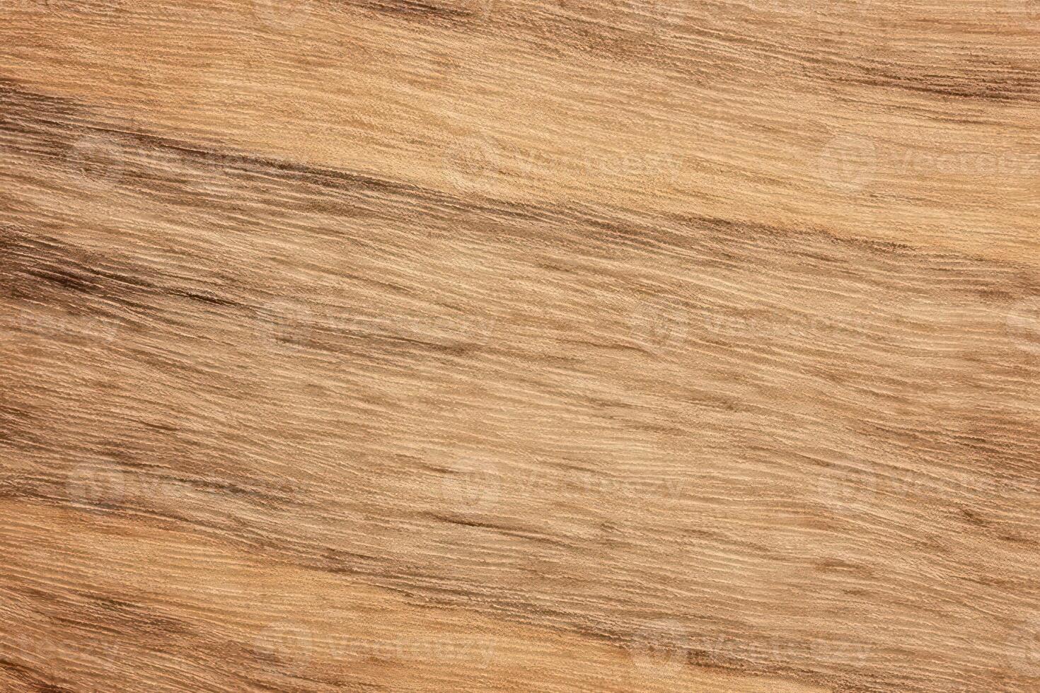 A close up of a wooden surface with a brown stain photo