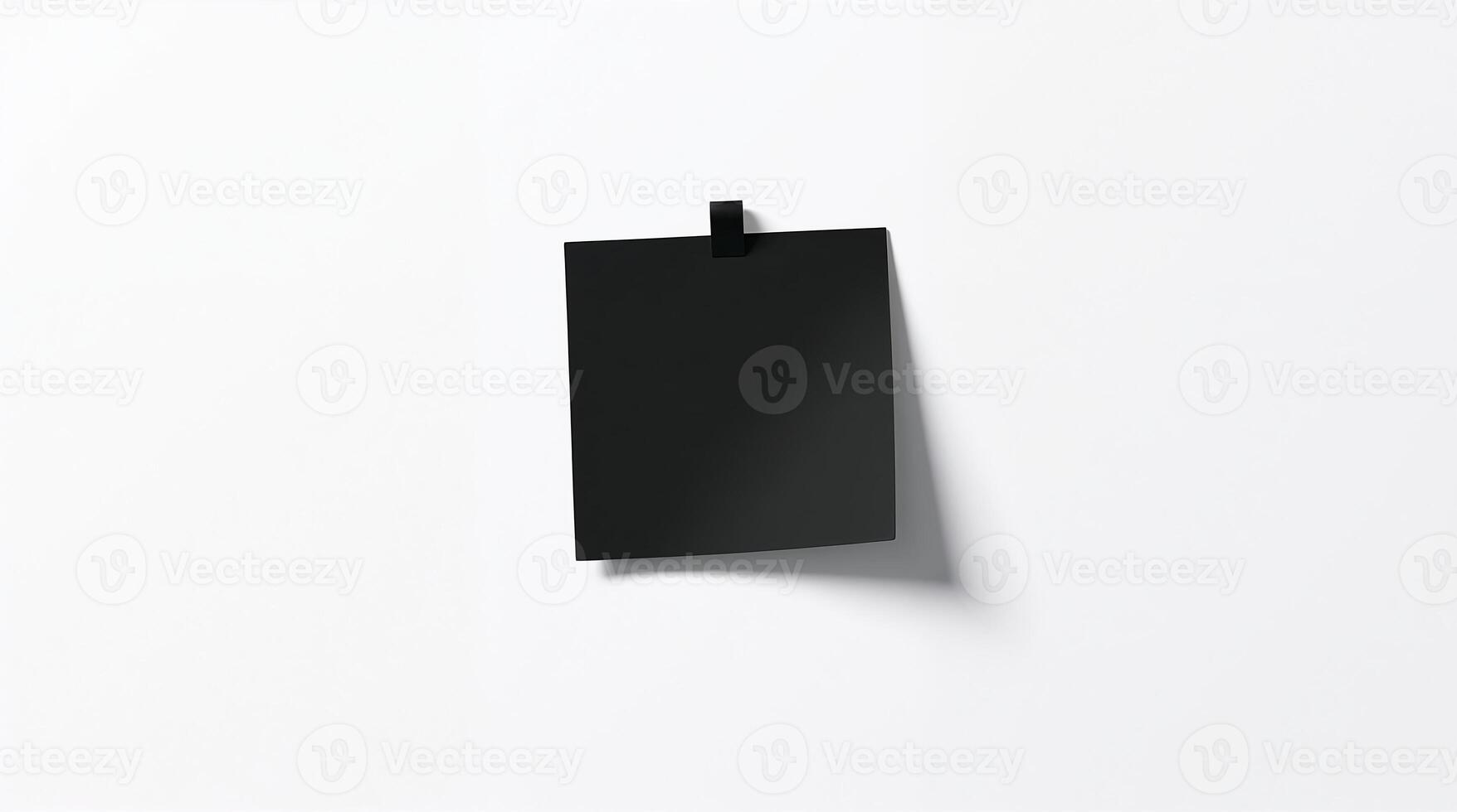 A simple black-and-white sticky note logo with clean lines, balanced shapes, and strong shadows for a bold look. photo