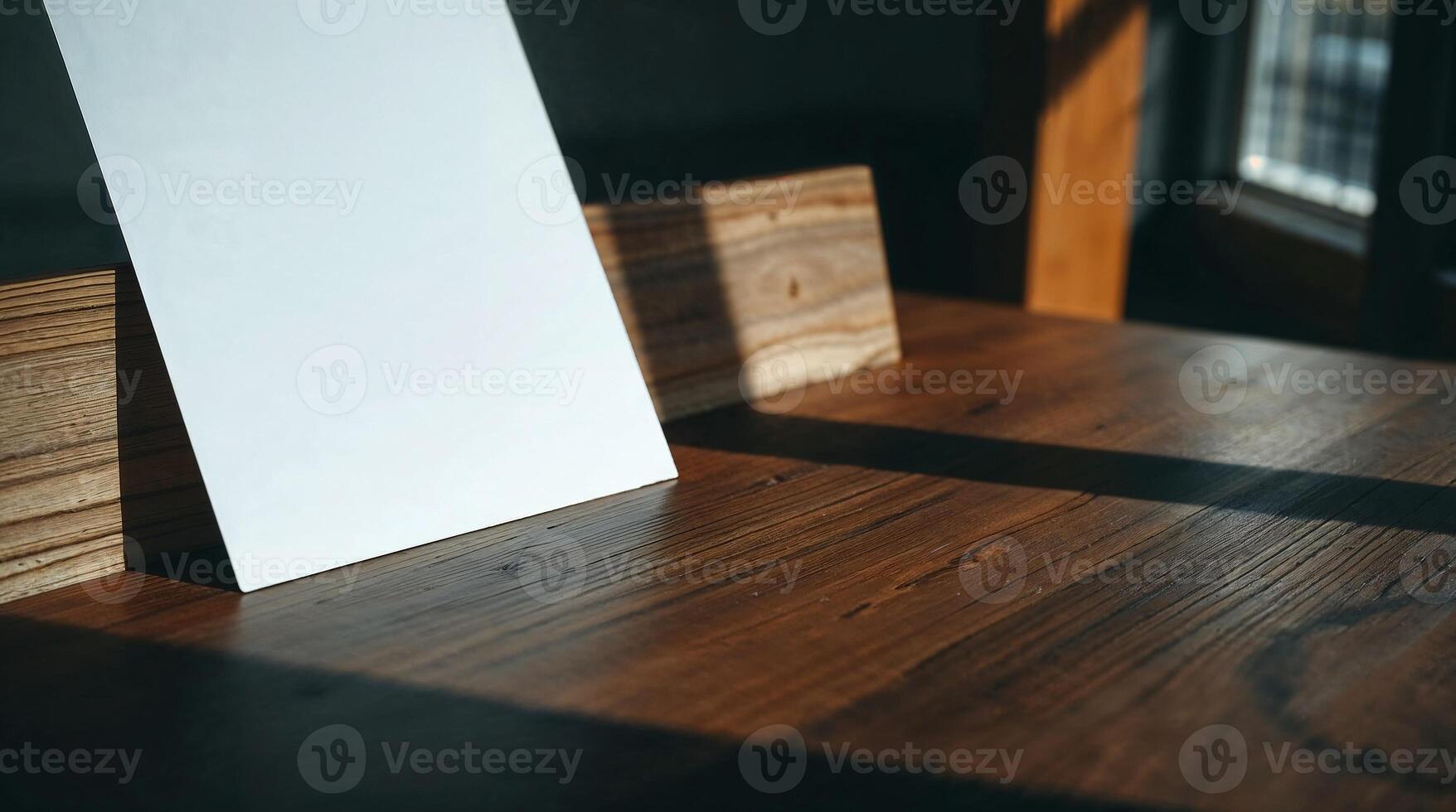 A photo of a wooden desk and paper. High contrast, deep shadows, and visible wood grain create a moody, urban style.