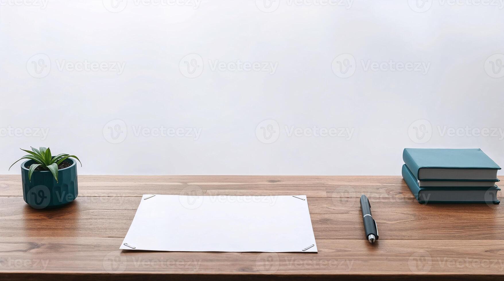 Simple wooden desk with blank paper. Soft light, thick fog, and deep teal tones create a luxurious still life. photo