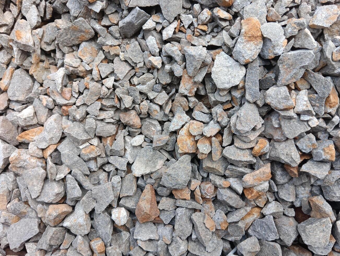 Crushed gravel texture surface for construction background, perfect for use in design, engineering, and road material stock photo