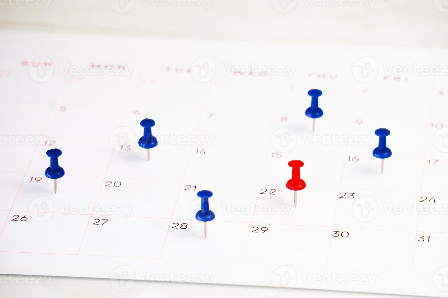 date marked push pin on calendar for background photo