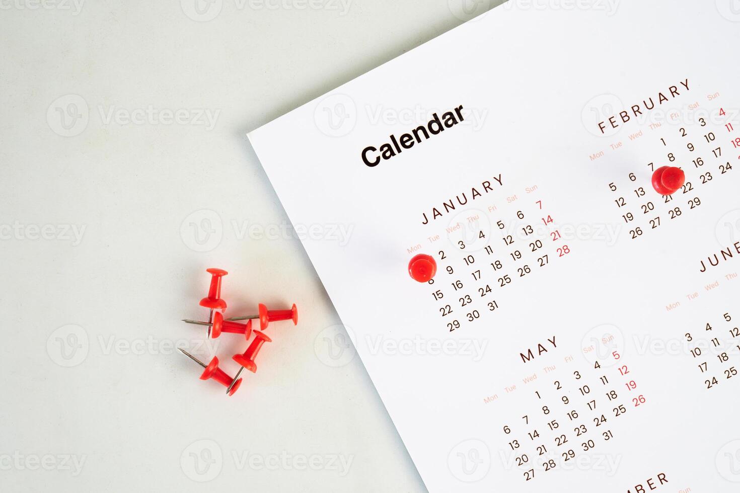 Important dates on calendar with a red Pin photo