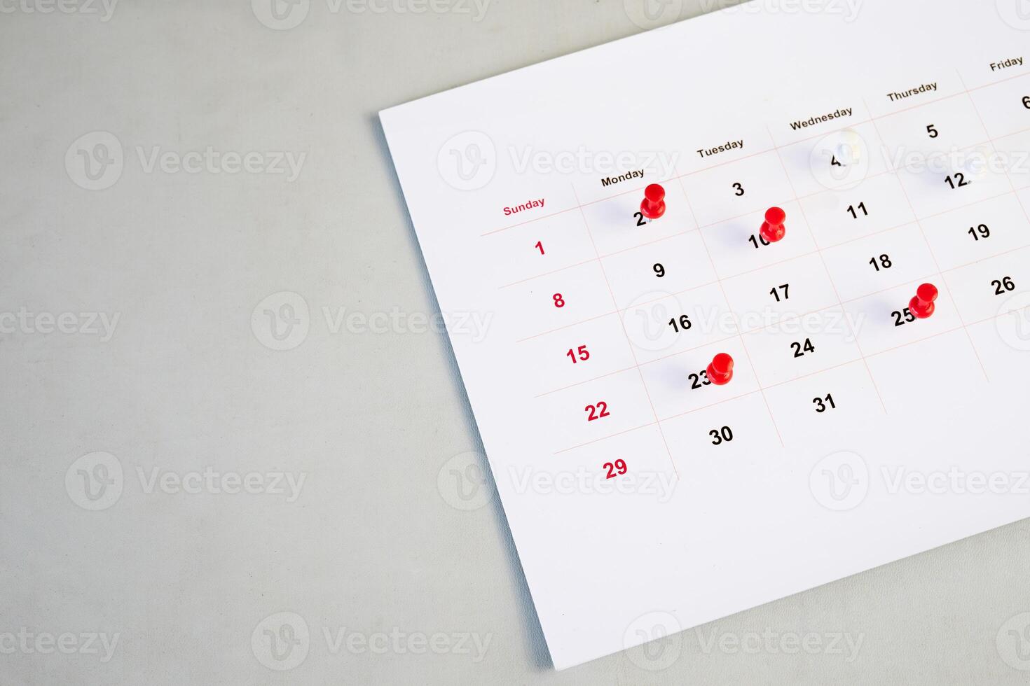 background of calendar and red push pin photo